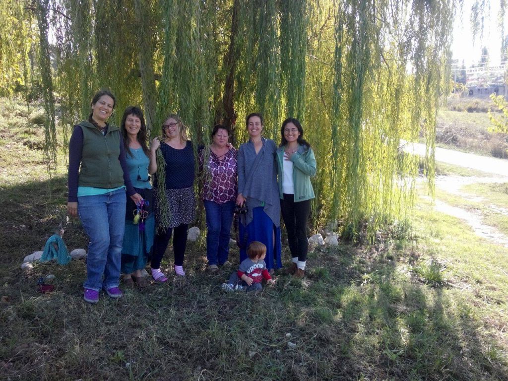 Women at a Goddess Full Moon Gathering under the wishing tree at Natural Springs Retreat, Turkey