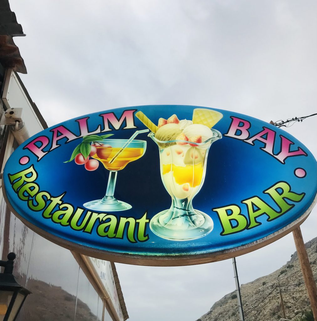Colourful Palm Bay Hotel Sign Image
