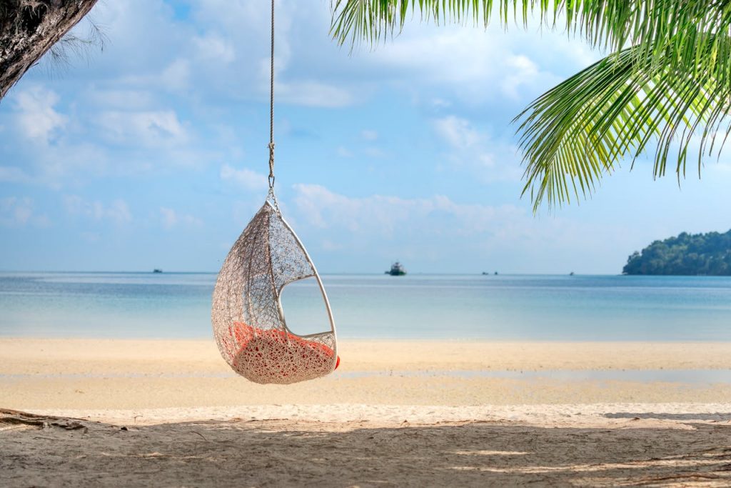 Hammock chair on a sunny empty beach