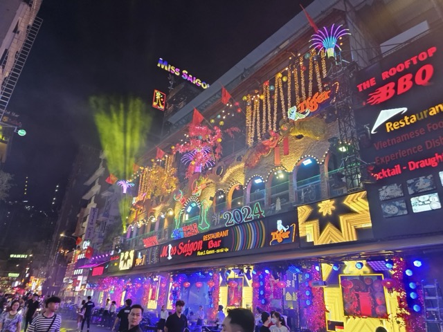 Brightly lit Vietnam street at night