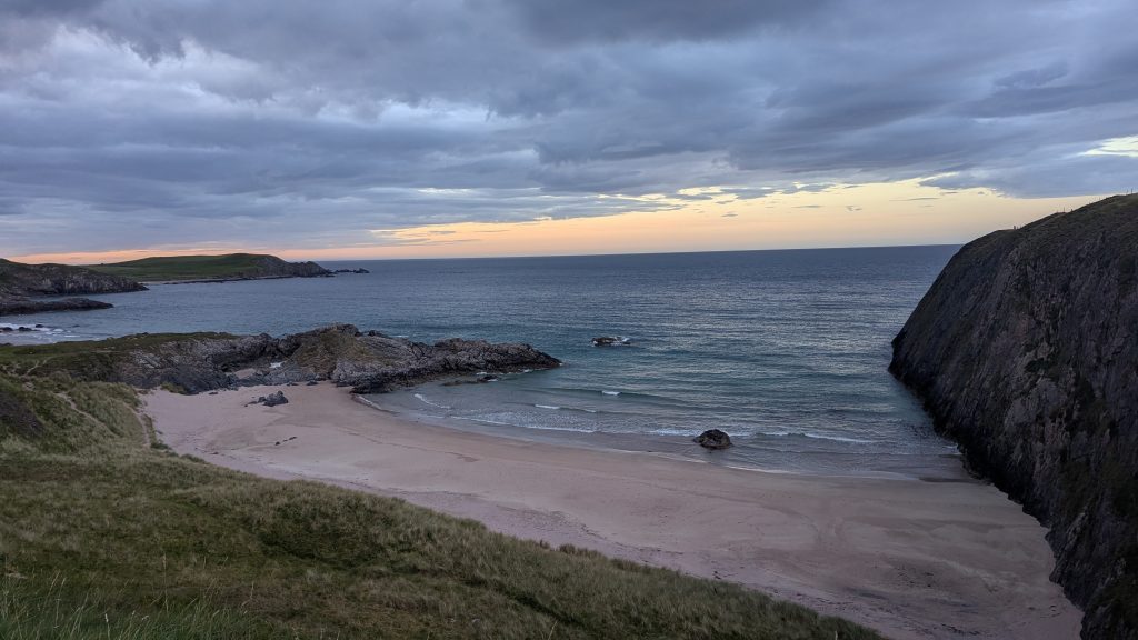 Sunset by the beach in the Highlands Scotland